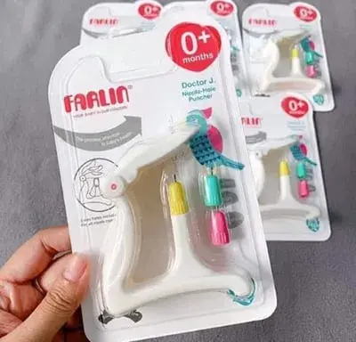 dụng cụ đục lỗ núm ty Farlin.